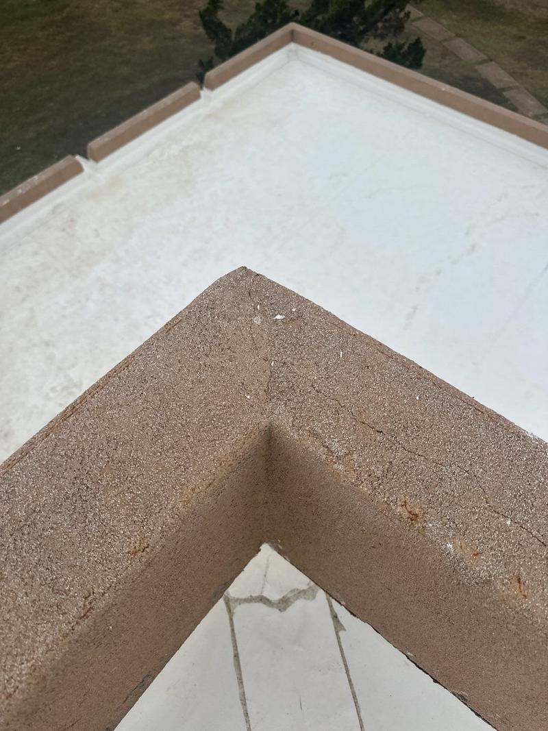 Outside corner detail of a TPO membrane at a parapet wall